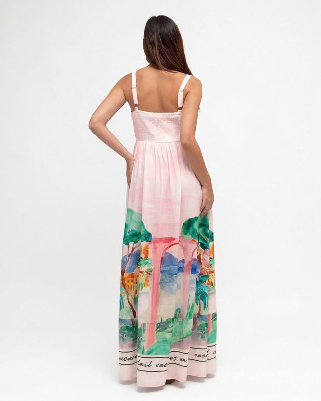 Woman wearing a colorful dress with a white background