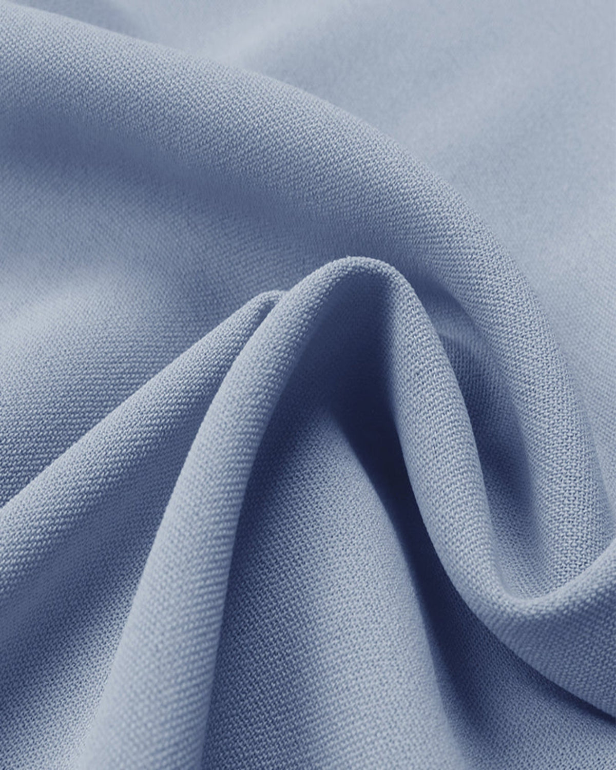 Close-up of light blue fabric with a soft texture