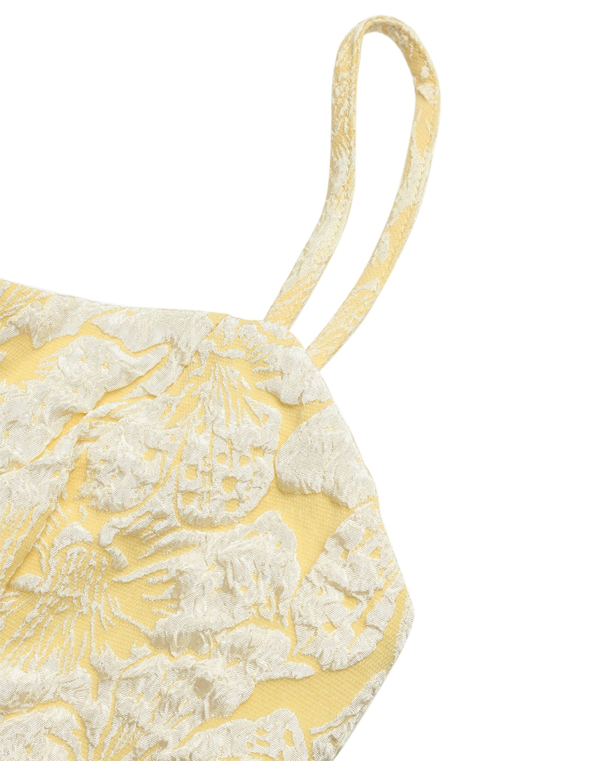 Yellow floral patterned bag with a strap on a white background