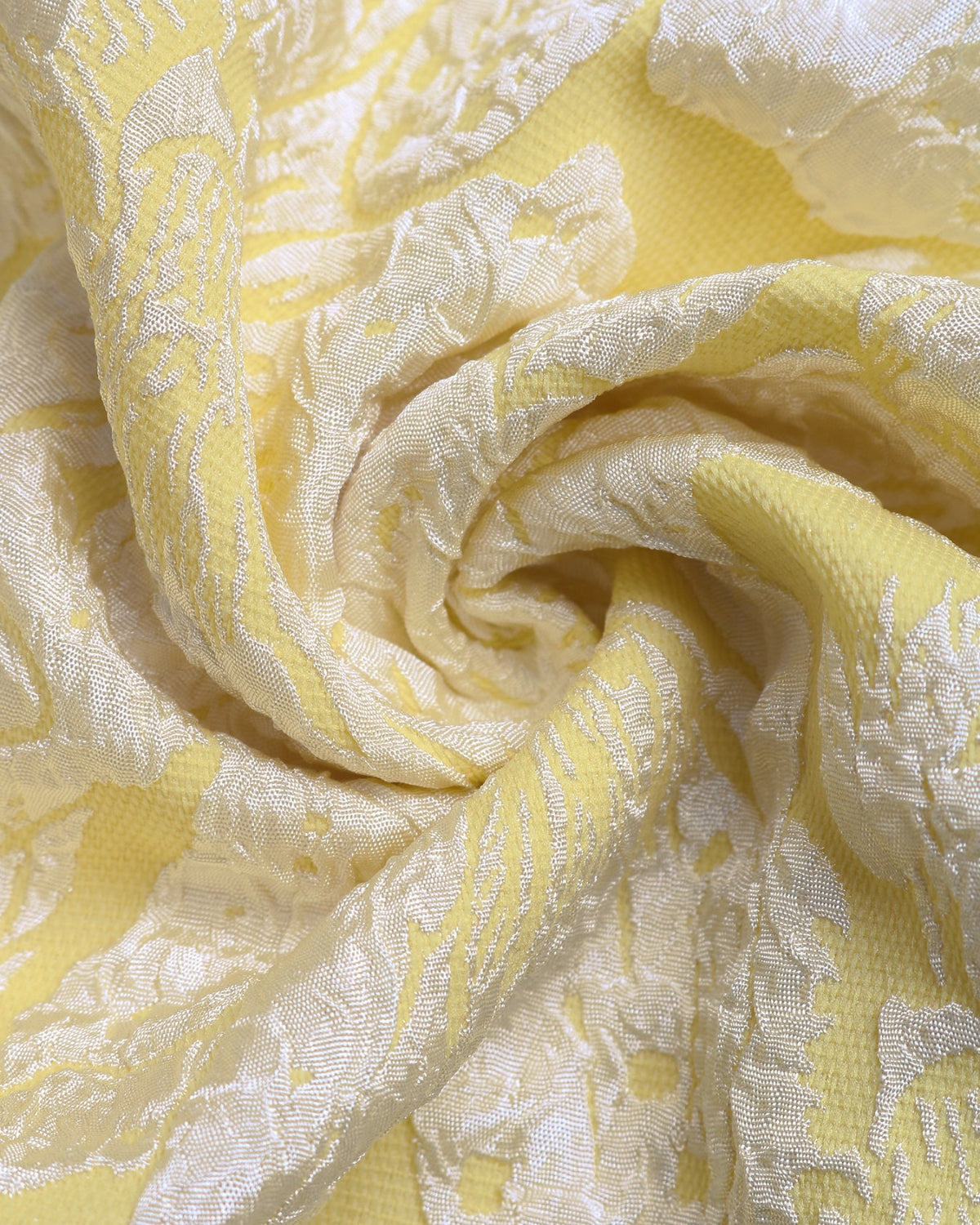 Close-up of yellow and white patterned fabric