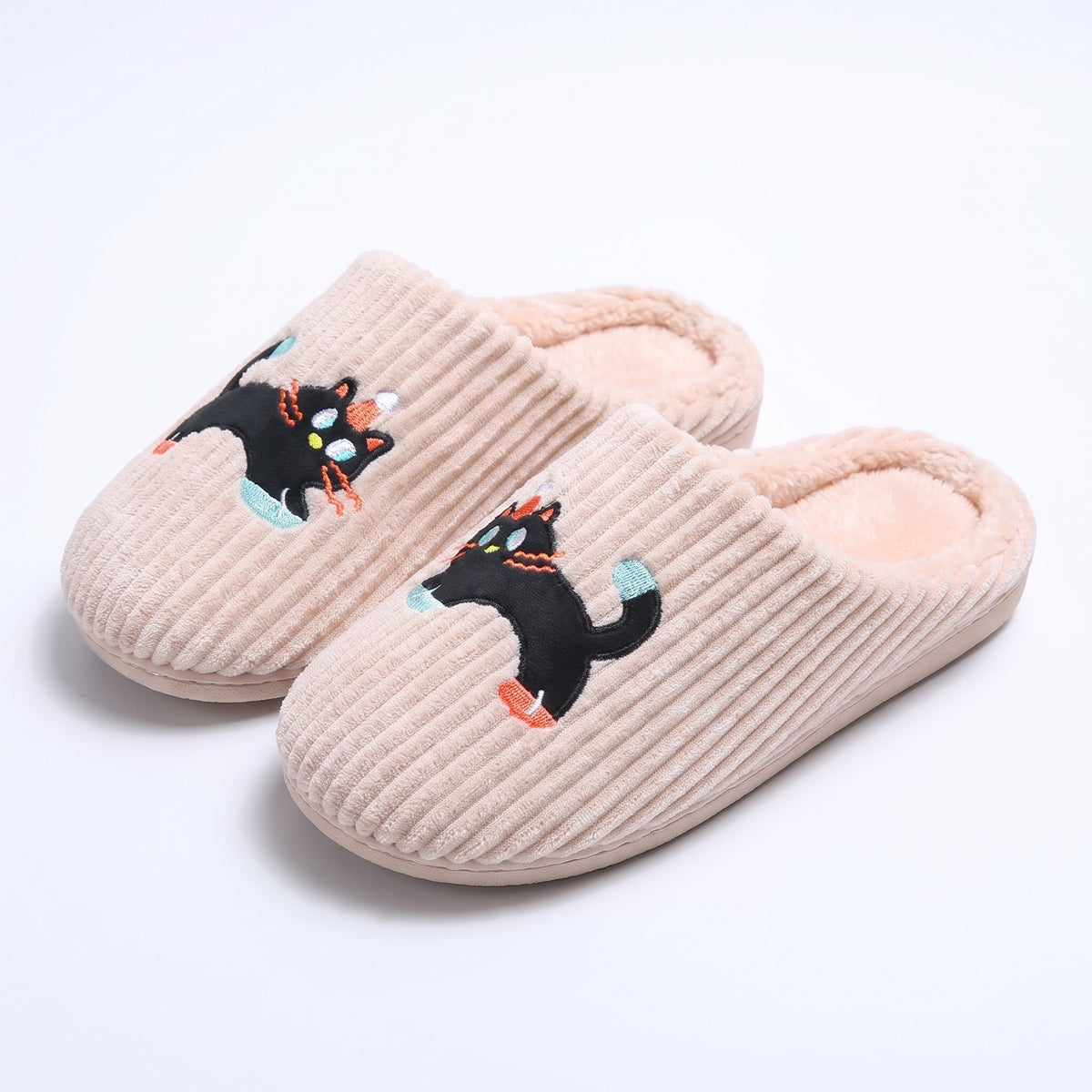 Pink ribbed slippers with embroidered black cat design