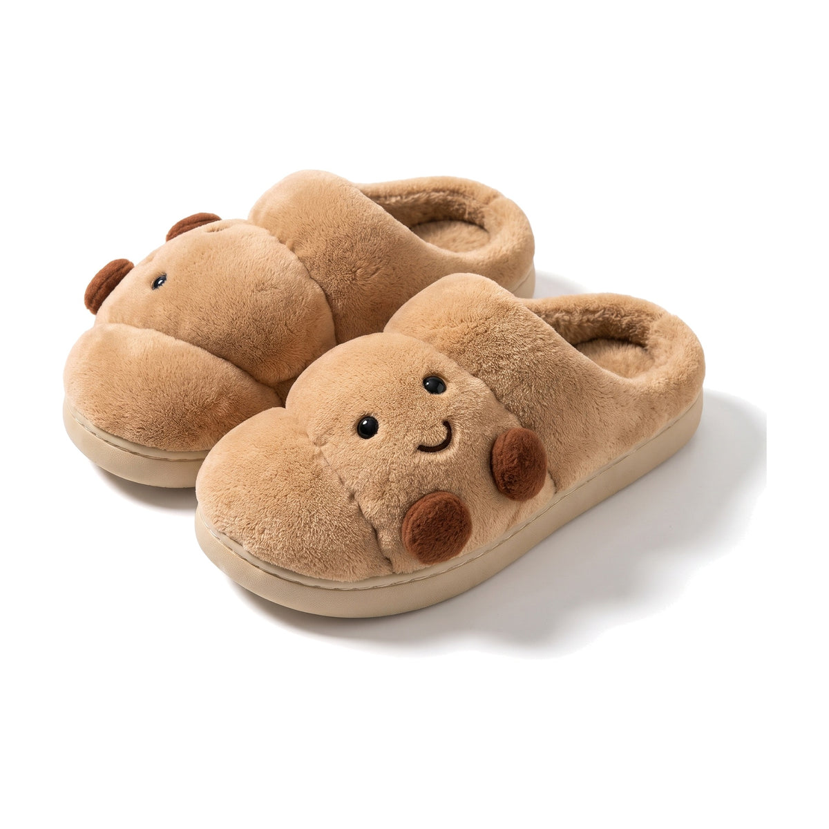 Tan plush croissant slippers with smiling face and brown cheeks