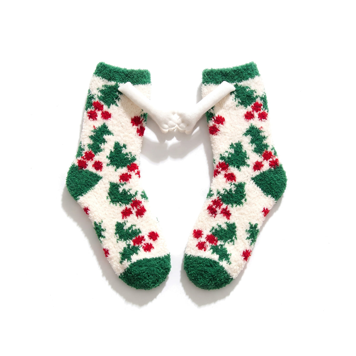 Christmas Tree fluffy hand holding socks laid flat with magnetic hands touching
