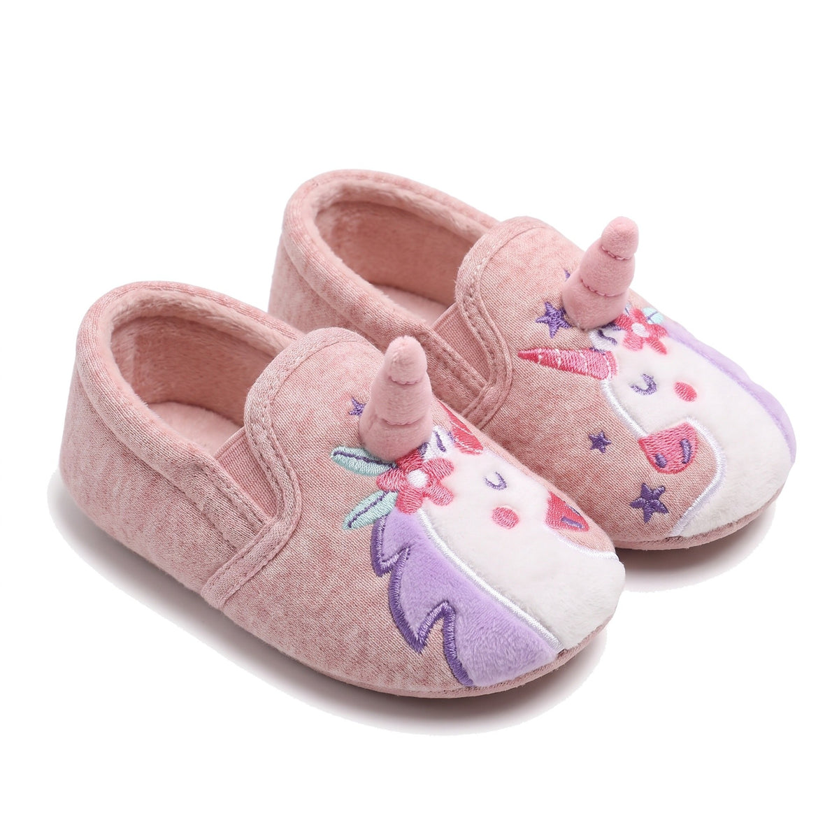Pink kids unicorn slippers with embroidered flowers, closed back and plush lining