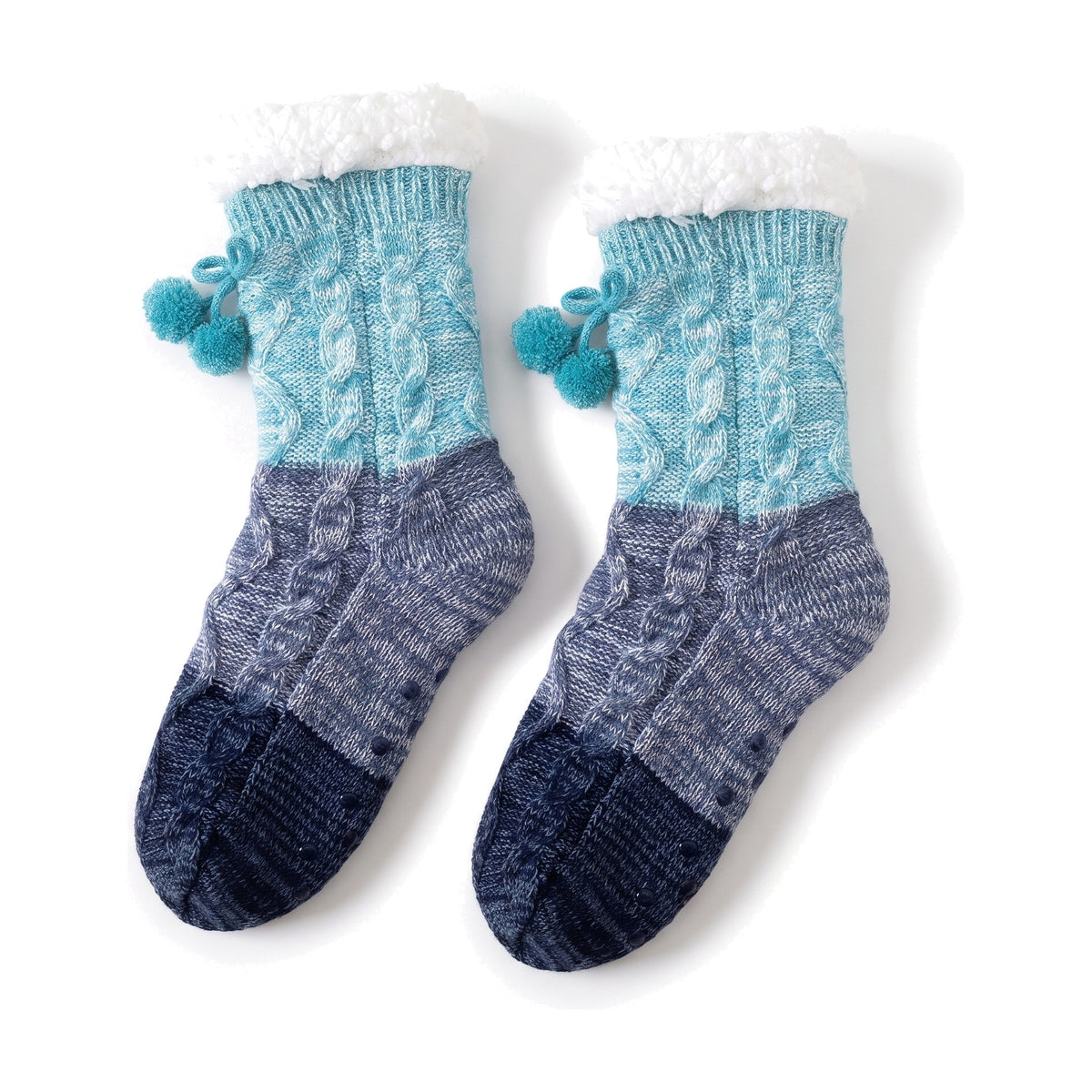 Blue cable knit slipper socks with sherpa cuff and pom pom tie