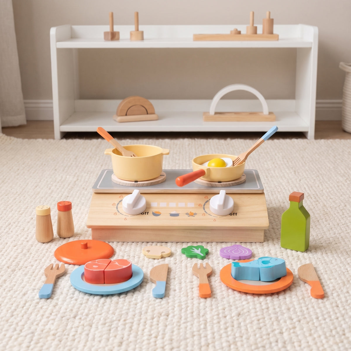 Wooden play kitchen set laid out in a calm Montessori playroom