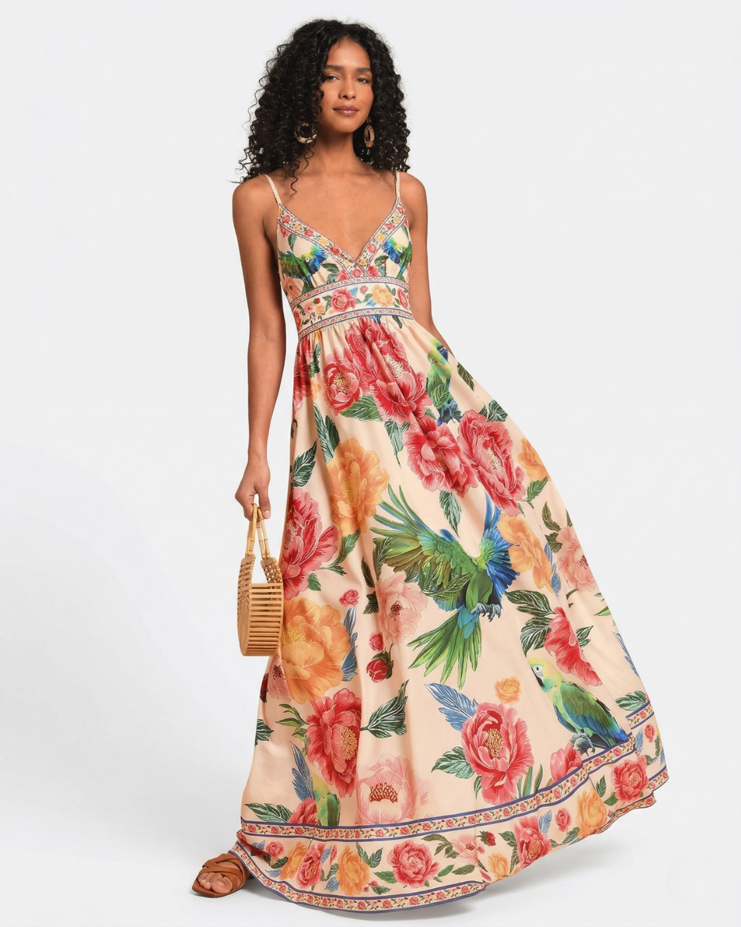 Woman wearing a floral dress on a white background