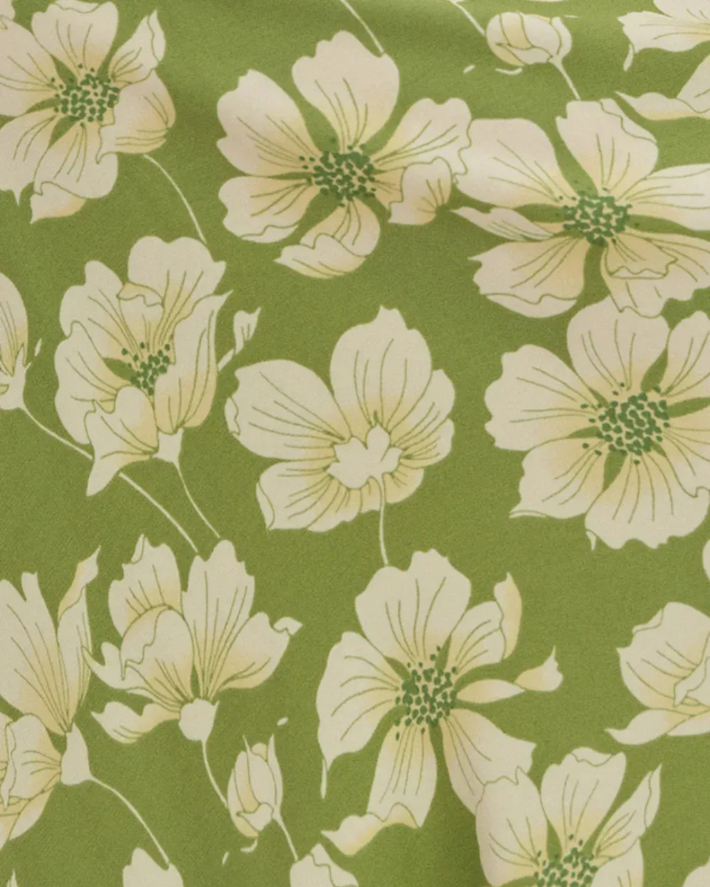 Floral pattern with white flowers on a green background