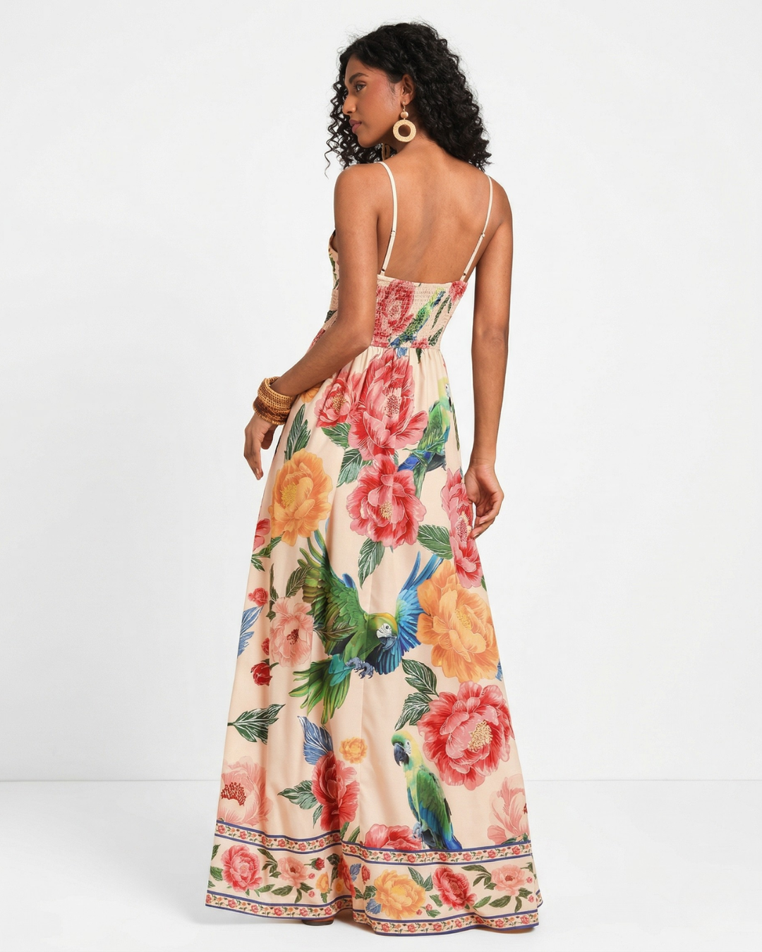 Woman wearing a floral dress on a white background