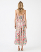 Woman wearing a floral dress on a white background