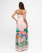 Woman wearing a colorful dress with a white background