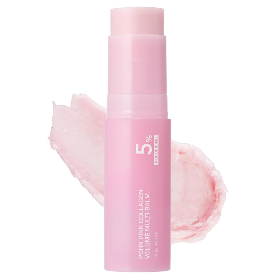 Pink collagen lip balm stick with a light pink cap and a matching pink smear behind it, on a white background. The label reads '5% VOLUME UP' and 'PORN PINK COLLAGEN MULTI BALM'.