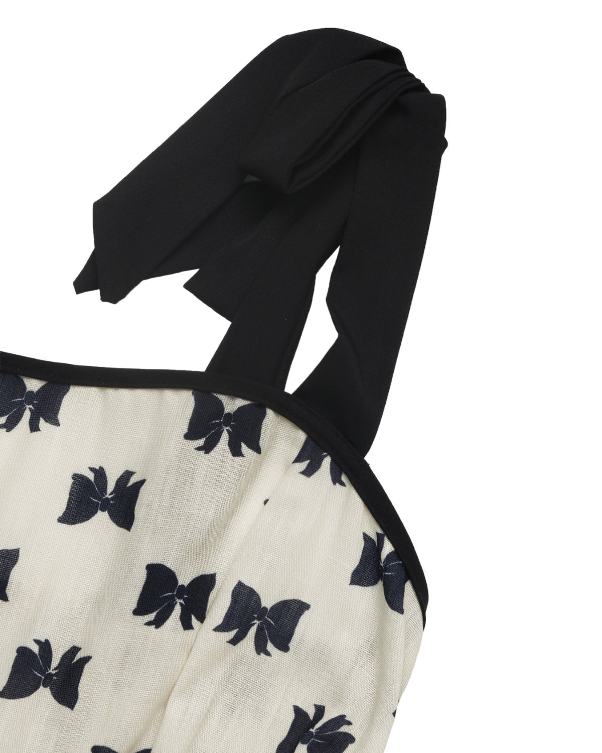 Black and white dress with butterfly pattern on a white background