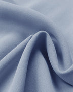 Close-up of light blue fabric with a soft texture