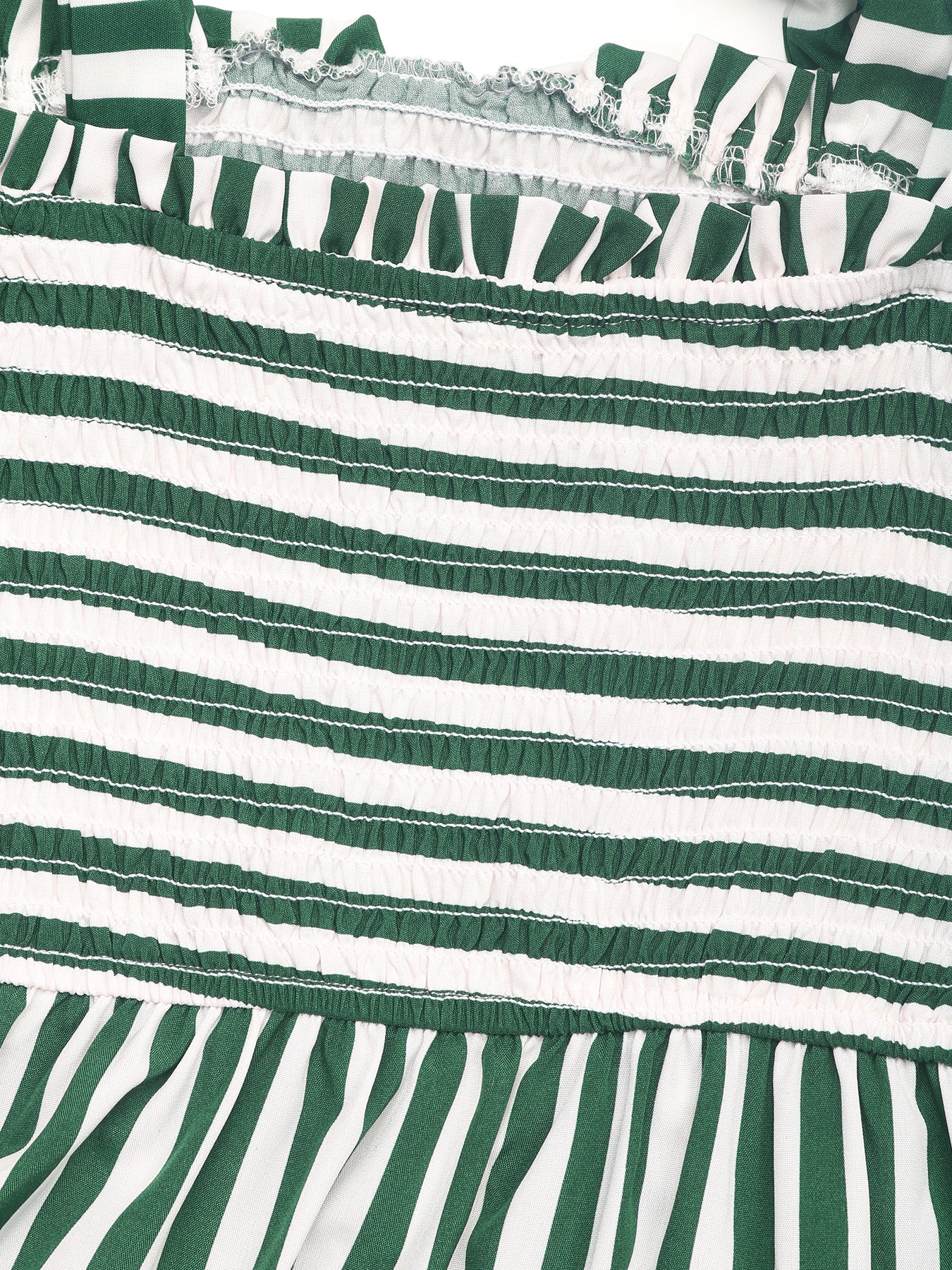 Close-up of green and white striped fabric with ruffled texture