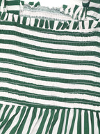 Close-up of green and white striped fabric with ruffled texture