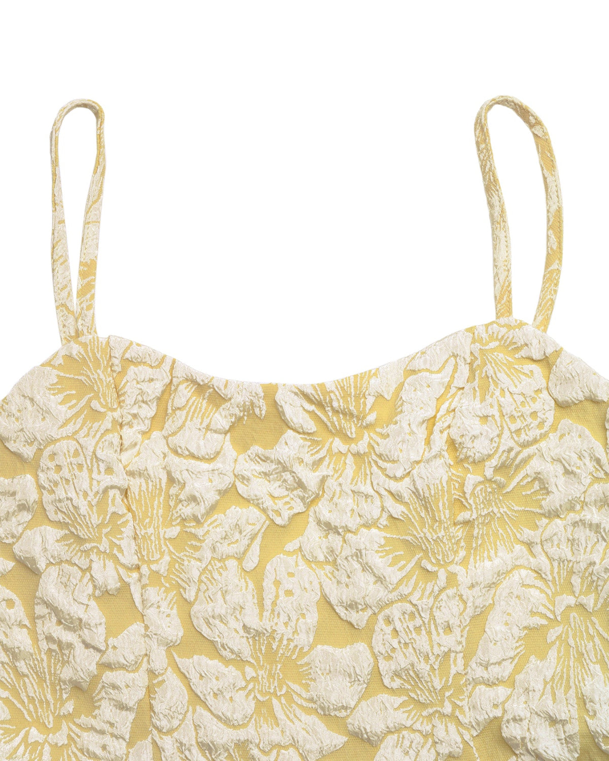 Yellow floral top with thin straps on a white background
