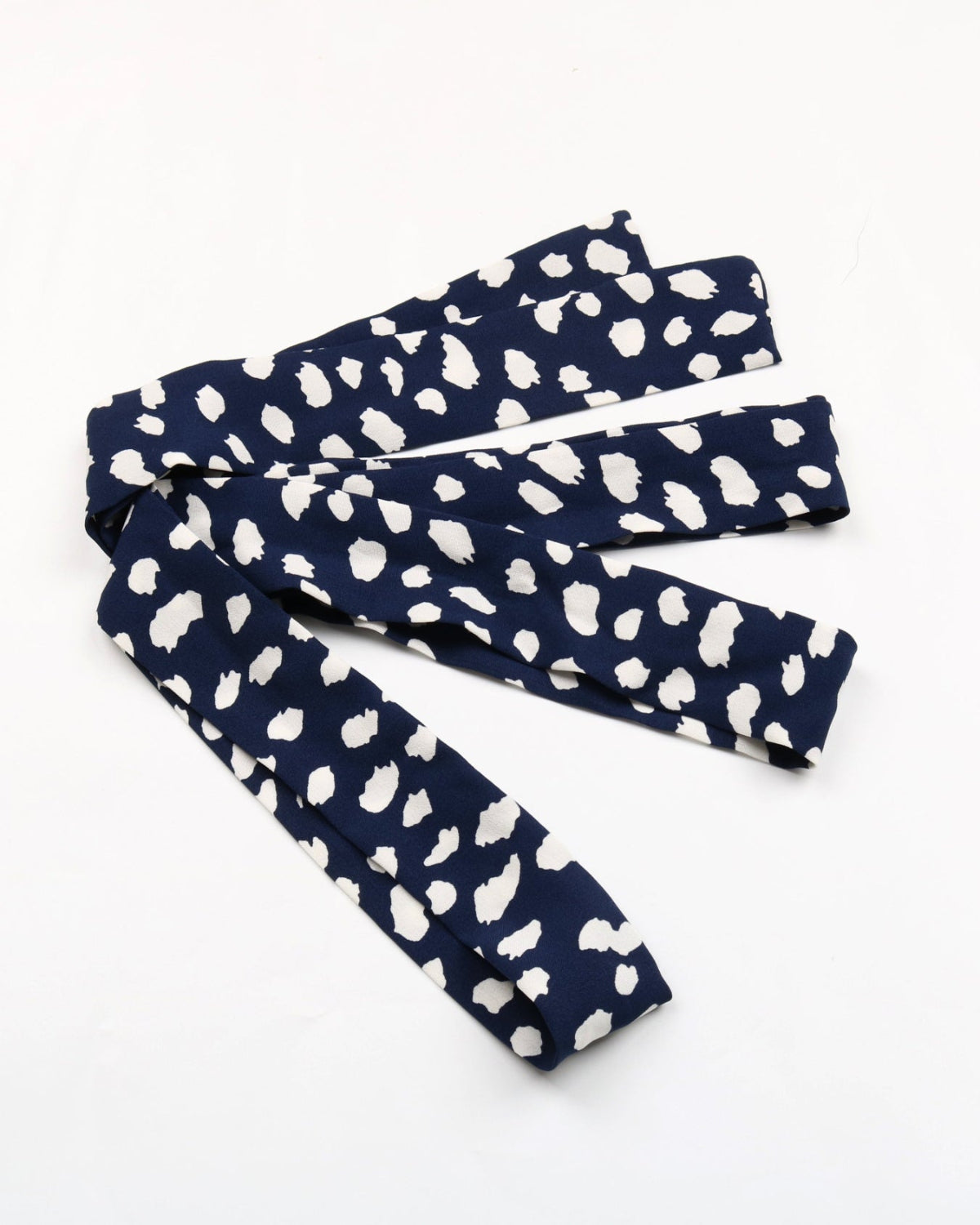 Navy headbands with white pattern on a white background