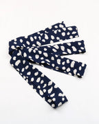 Navy headbands with white pattern on a white background