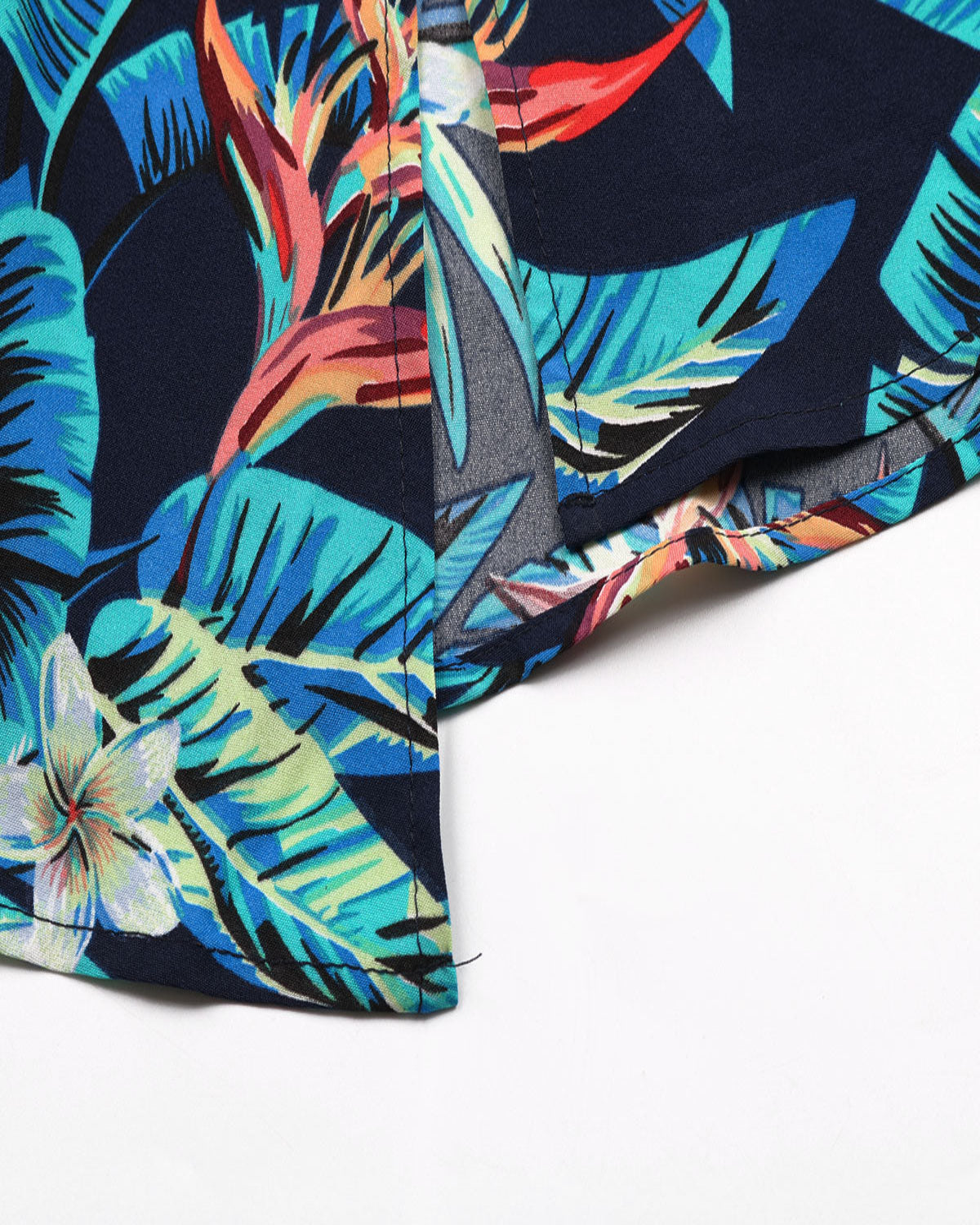 Colorful tropical leaf pattern on a black background