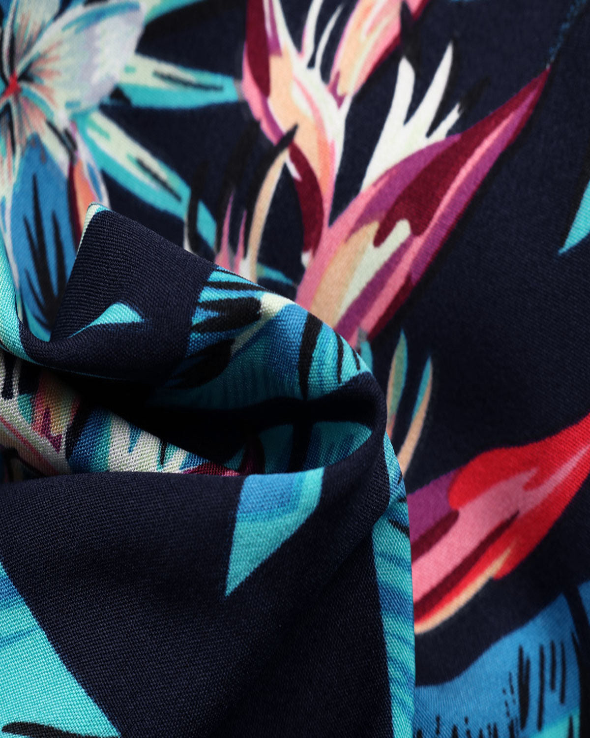 Close-up of colorful tropical leaf pattern fabric