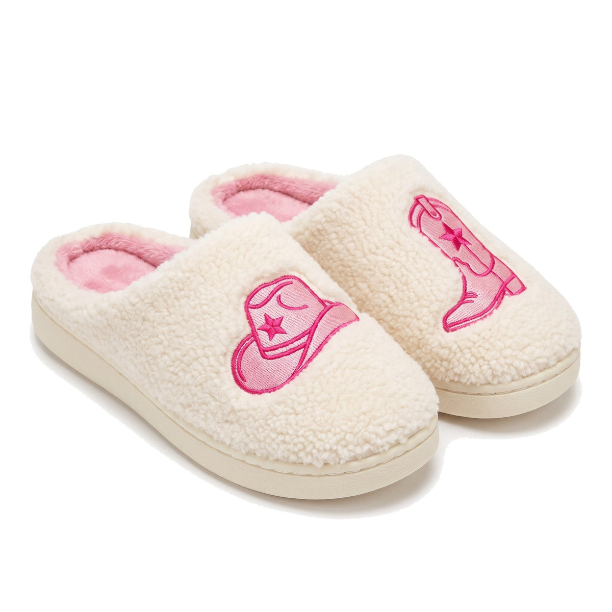 Fluffy cream slippers embroidered with a pink cowboy hat and cowboy boot