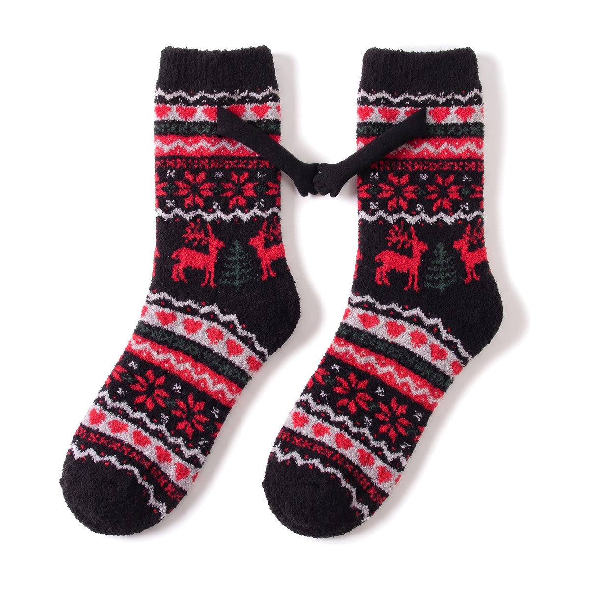 Black Fair Isle fluffy hand holding socks laid flat with magnetic hands touching