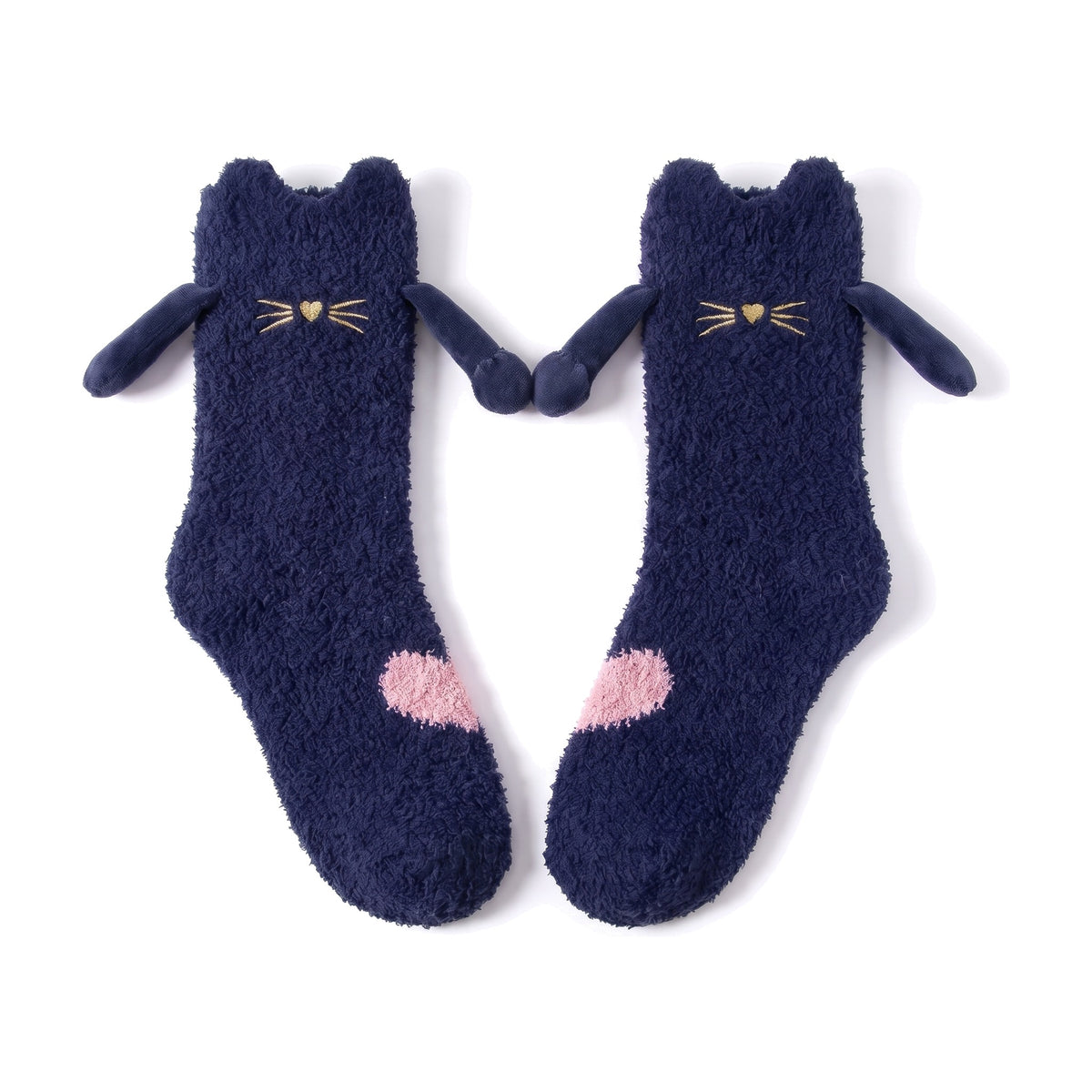Navy Cat fluffy hand holding socks laid flat with magnetic hands touching