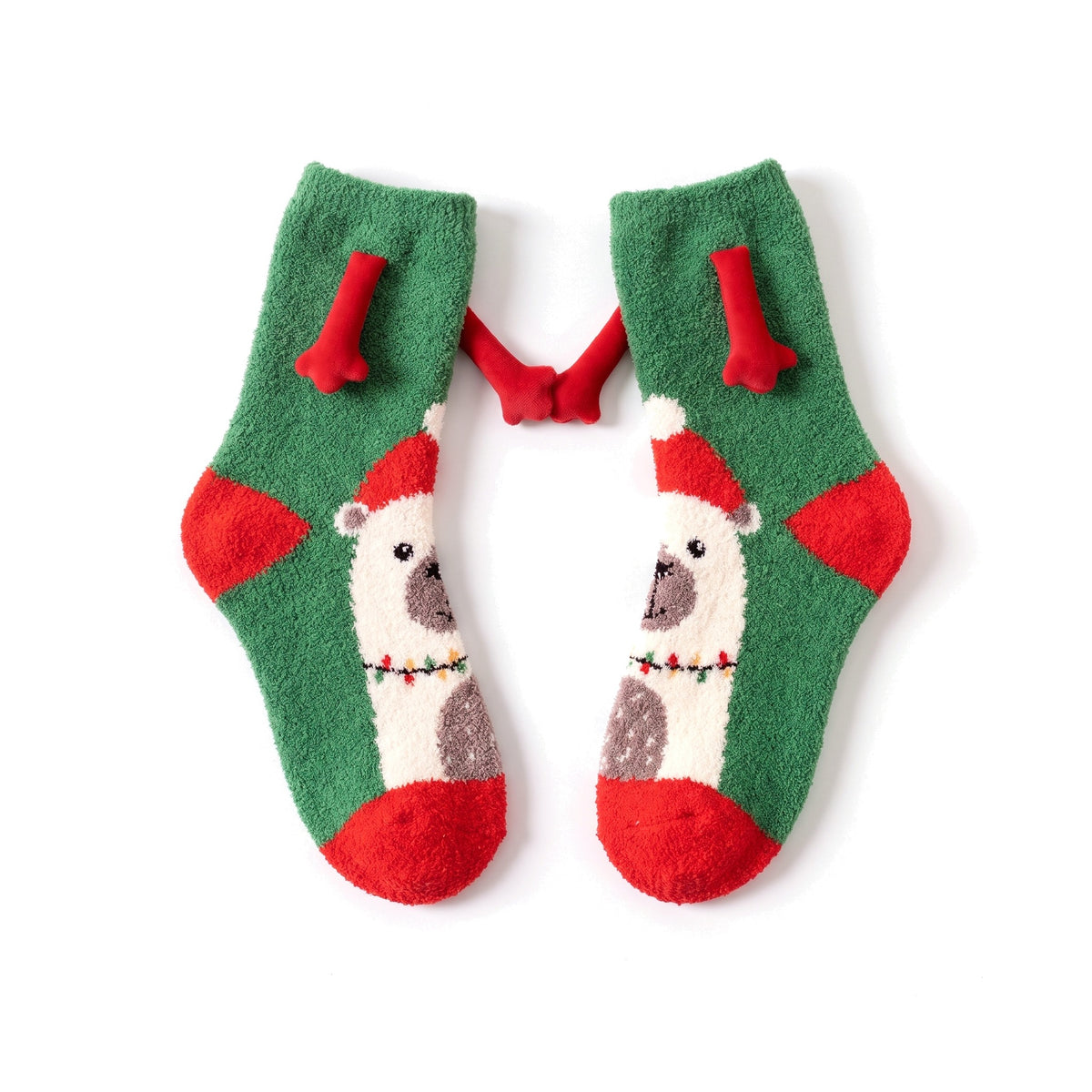 Polar Bear fluffy hand holding socks laid flat with magnetic hands touching