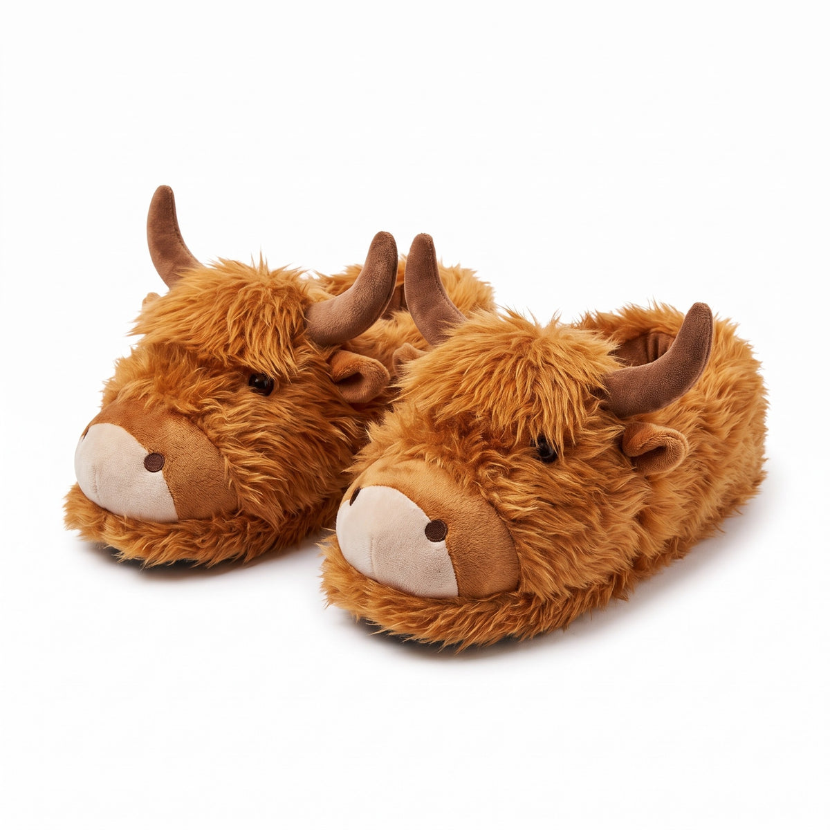 Ginger highland cow slippers with soft horns and shaggy fringe