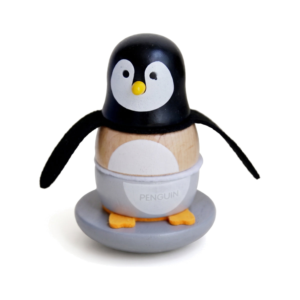 Wooden penguin stacking toy with black head, white belly, felt flippers and grey base
