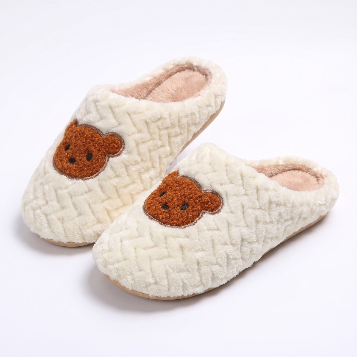 Cream knitted fleece slippers with embroidered teddy bear face