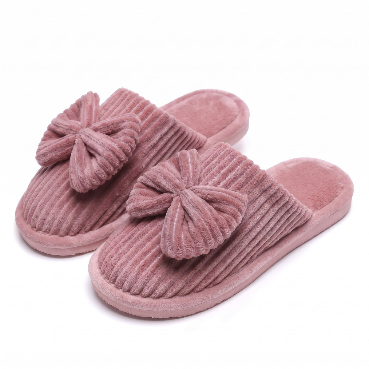 Dusky pink corduroy mule slippers with oversized bow